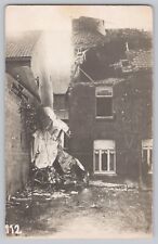 WWI Bi Wing Fighter Plane Aircraft Crashed Into Building Postcard picture